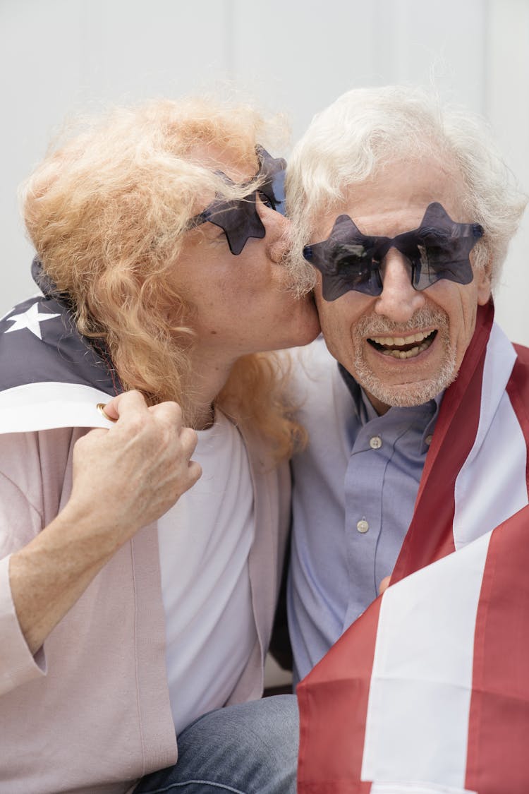 Happy Elderly Couple Kiss