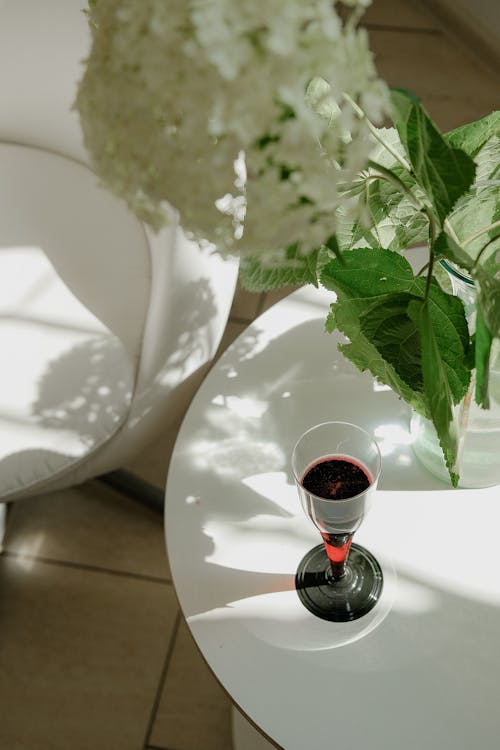 Clear Wine Glass on White Table