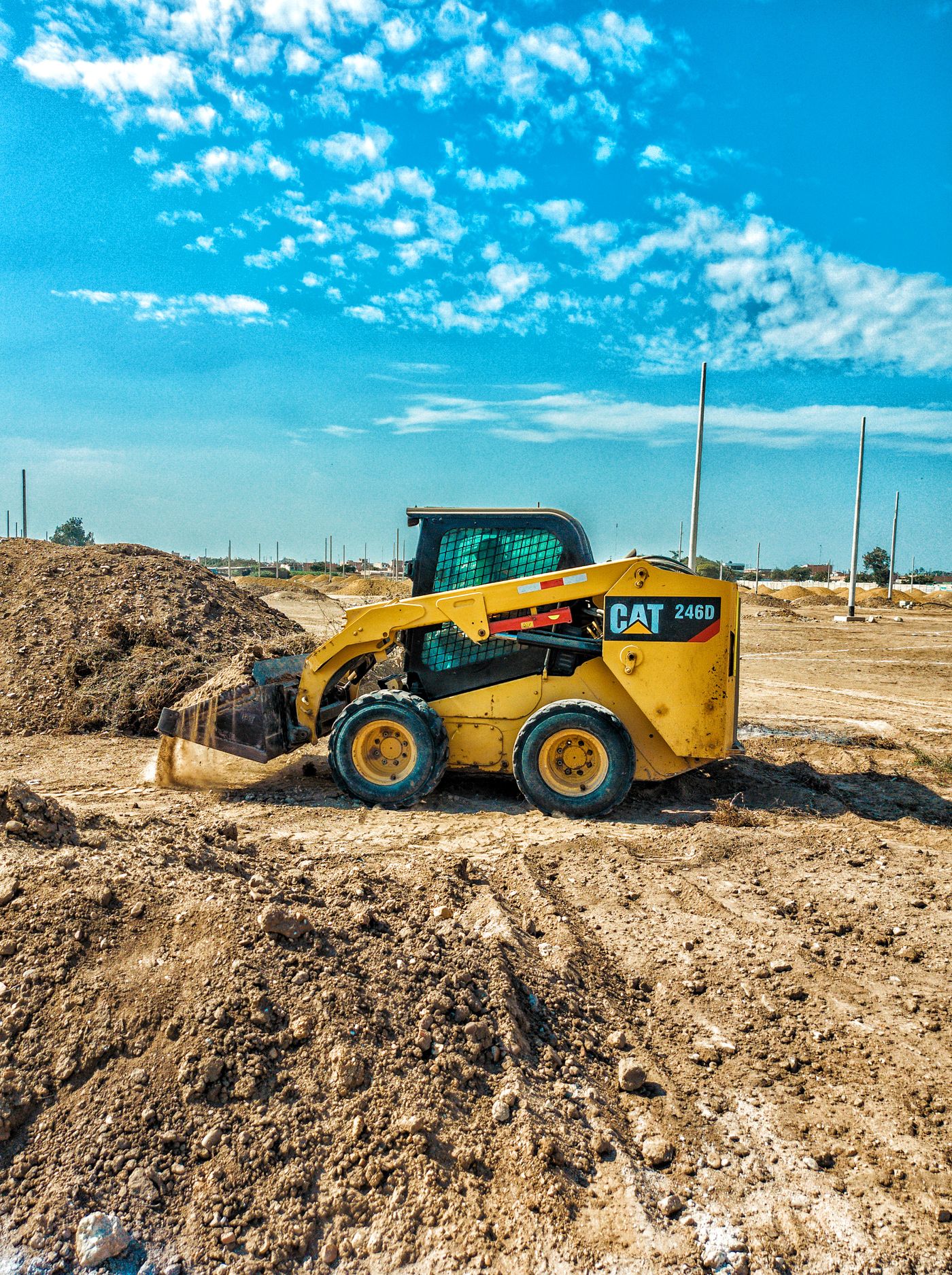 Skid steer loader working on a construction site