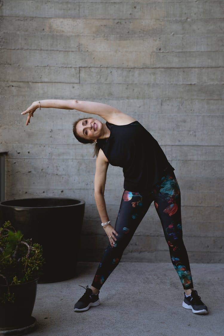 An Elderly Woman Stretching 