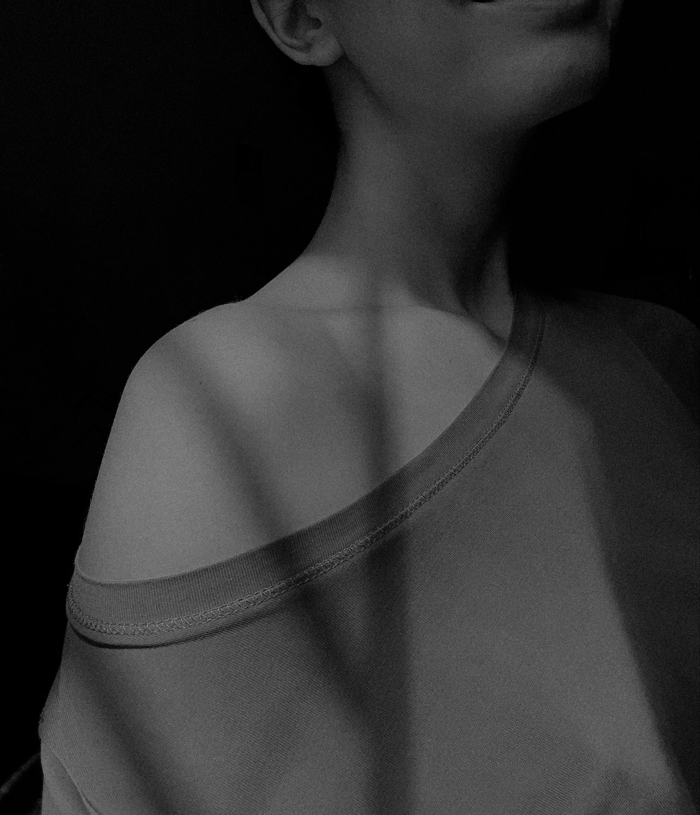 monochrome shot of the shoulder of a woman