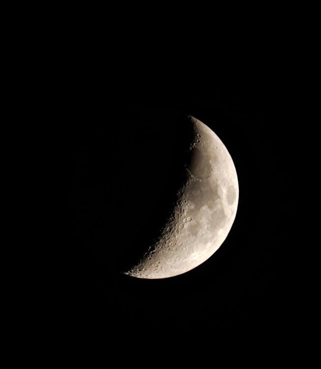 Close-Up Shot of a Crescent Moon
