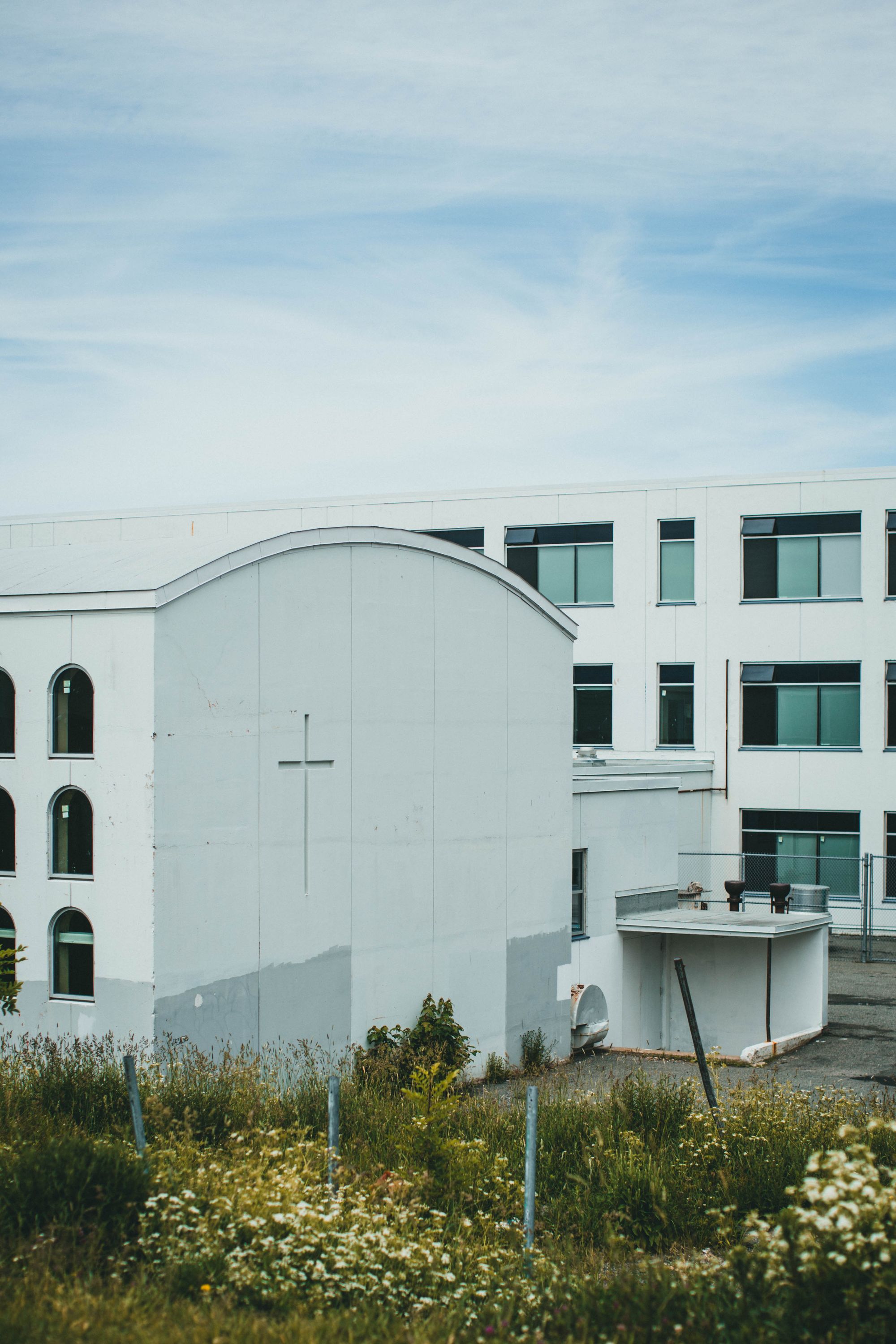 Modern church building with a cross on the exterior