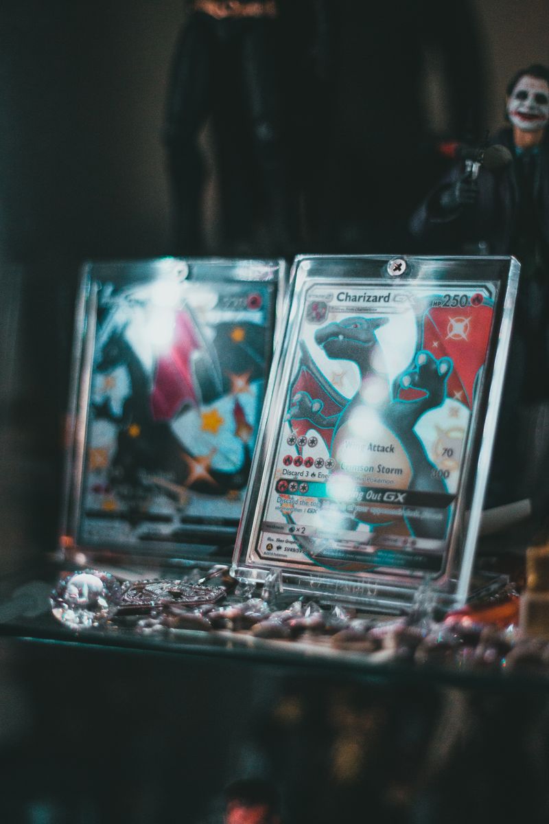 Collectible Pokémon cards in protective cases on display