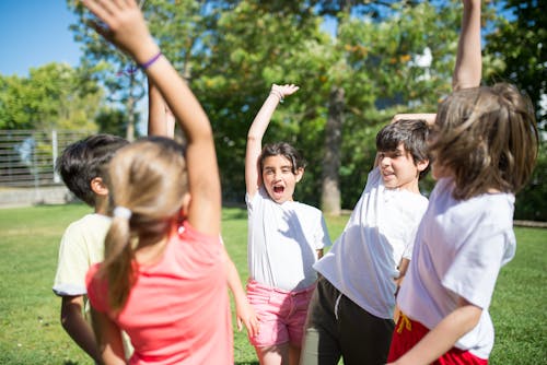 Free Group of Children having an Activity Together Stock Photo