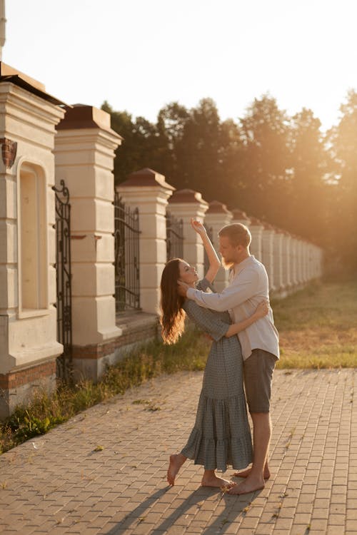 Free Woman Holding Man on his Waist Stock Photo