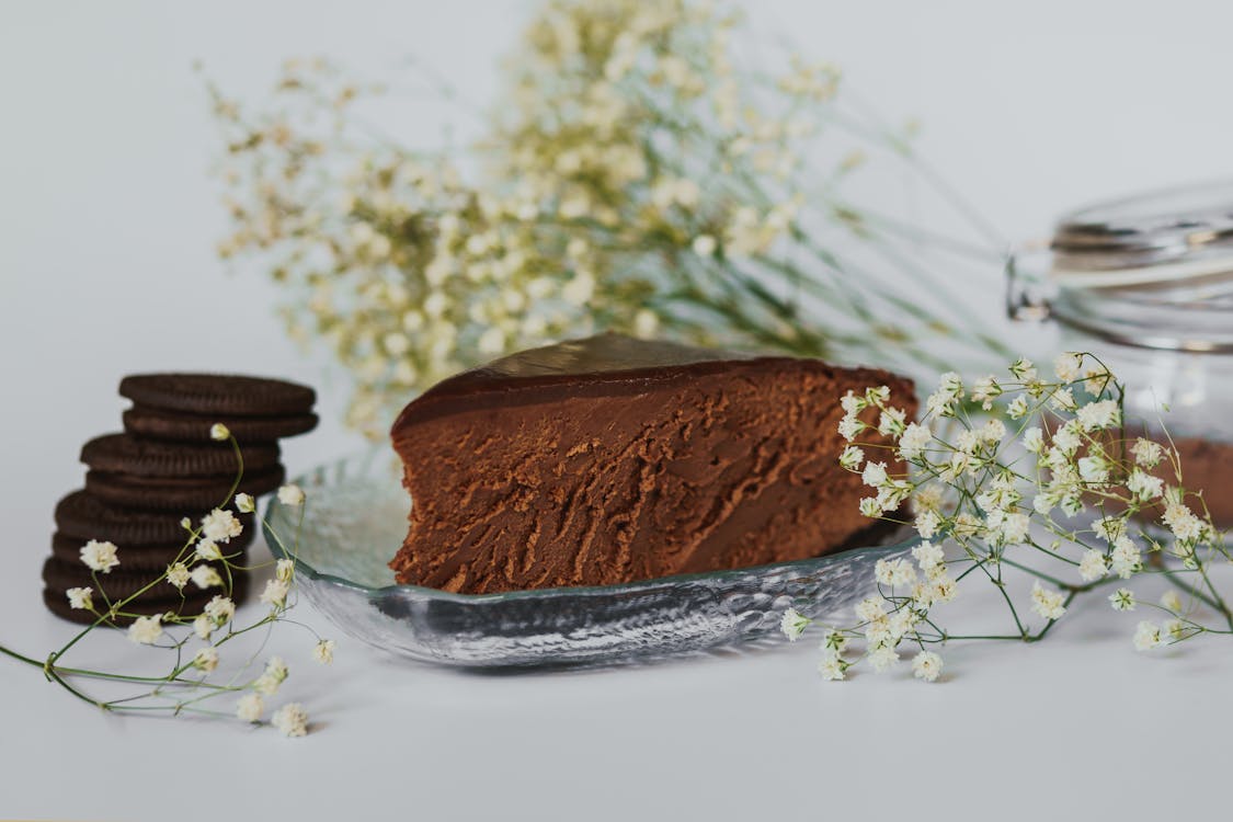 Free Close-Up Shot of a Slice of Chocolate Cake on a Plate Stock Photo