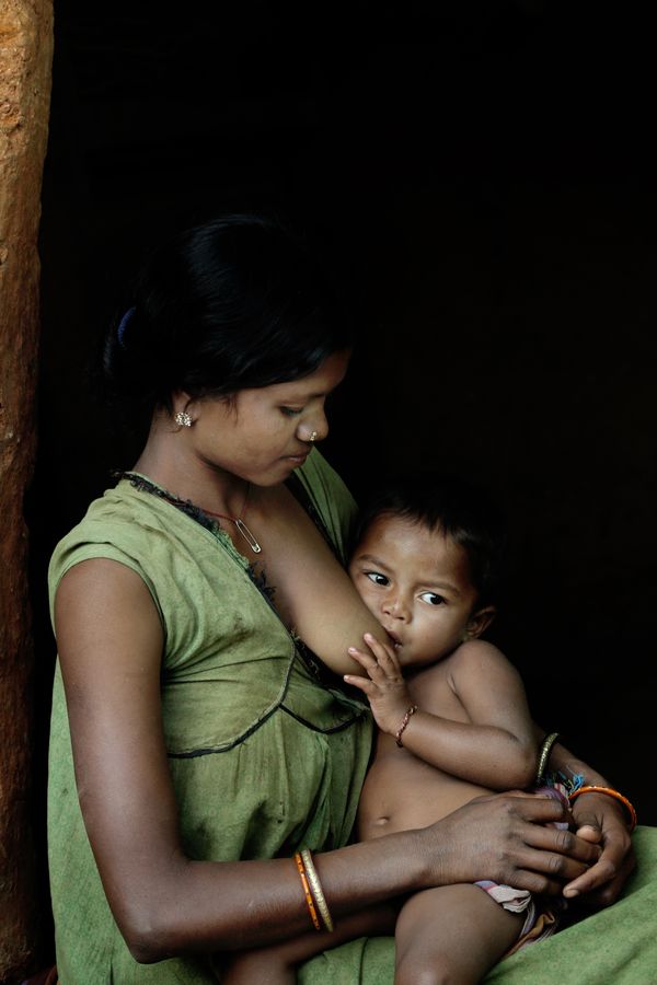 Mother caring for happy baby