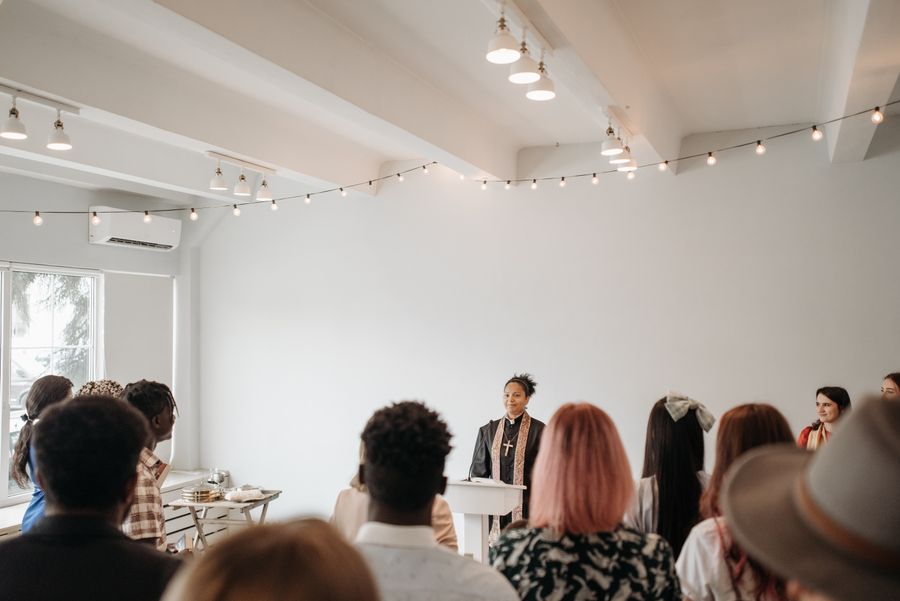 A pastor speaking to the congregation