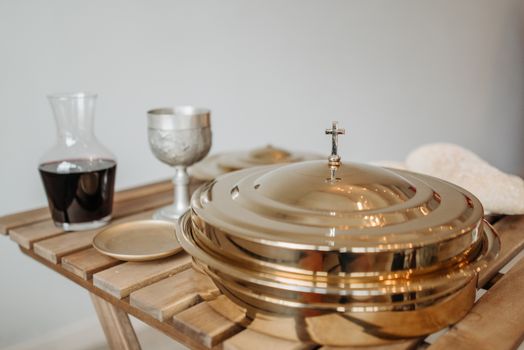 Communion Tray and Wine on a Decanter
