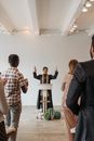 People Standing and Standing Inside Room