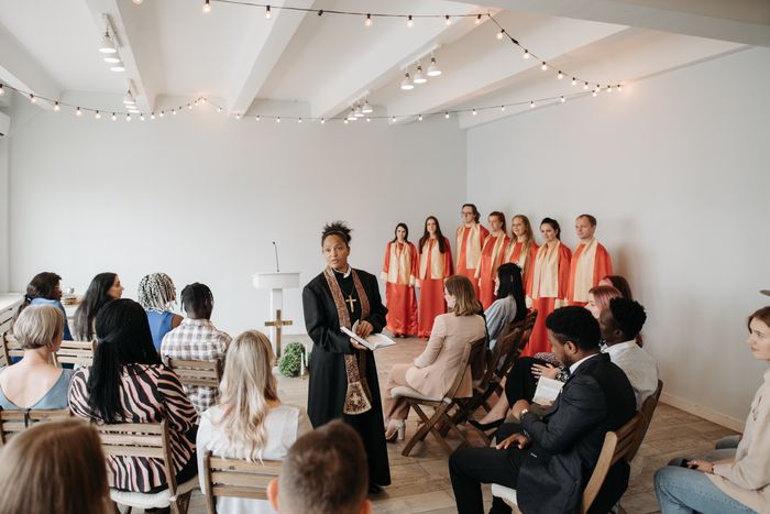 A pastor preaching to the congregation
