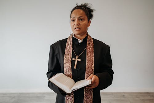 A Woman Pastor holding Bible