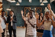 Group of People Standing and Smiling