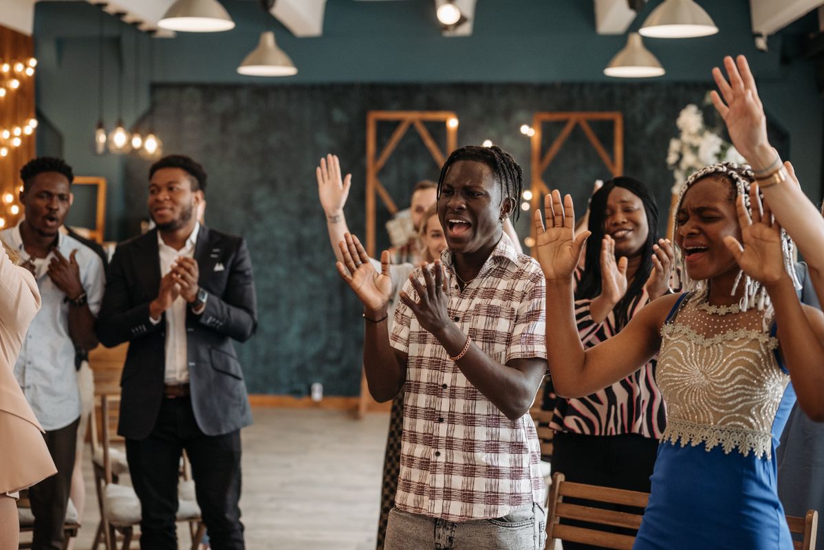A small congregation at worship together - Remember and worship
