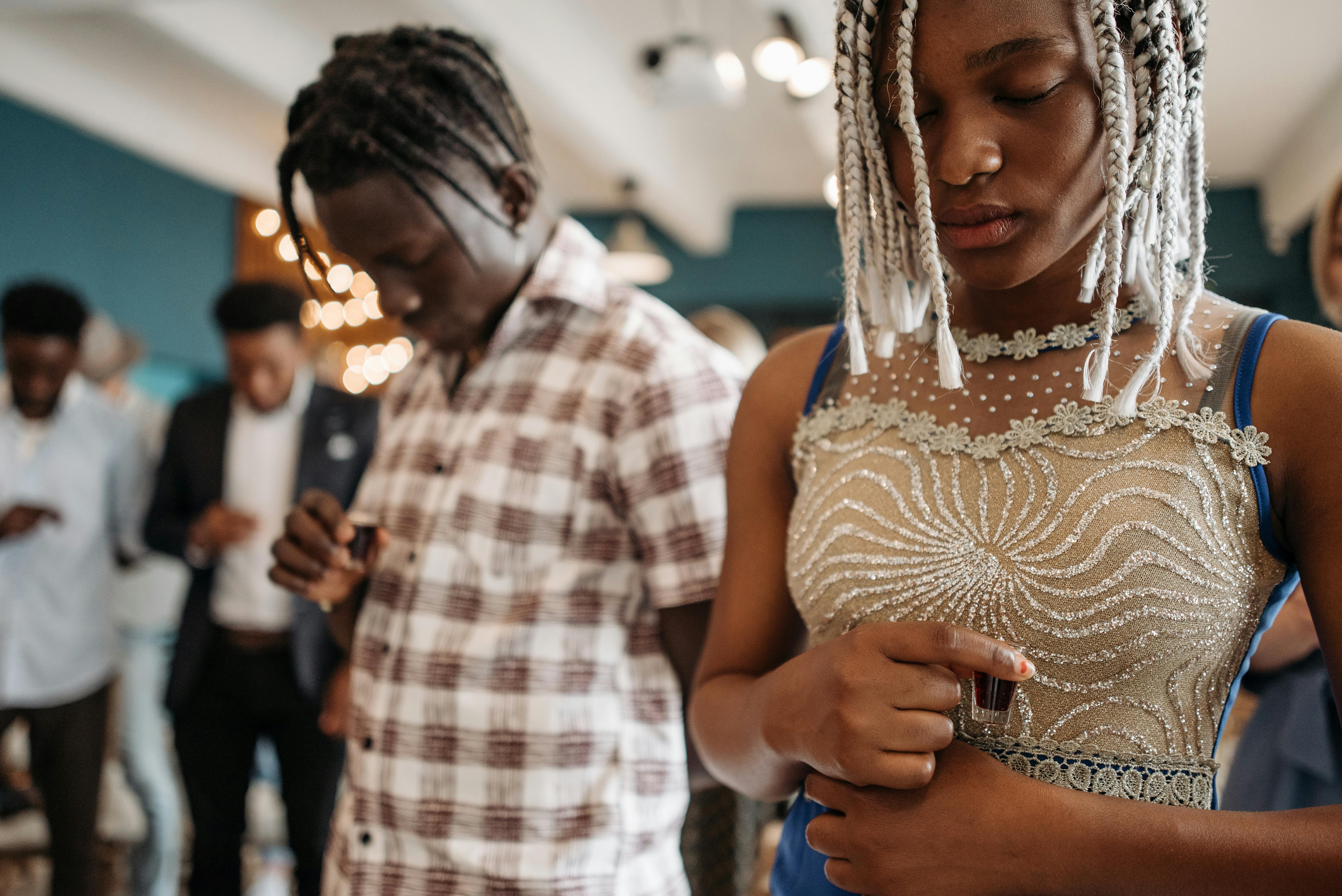 People Bowing Their Heads In Worship Of God · Free Stock Photo