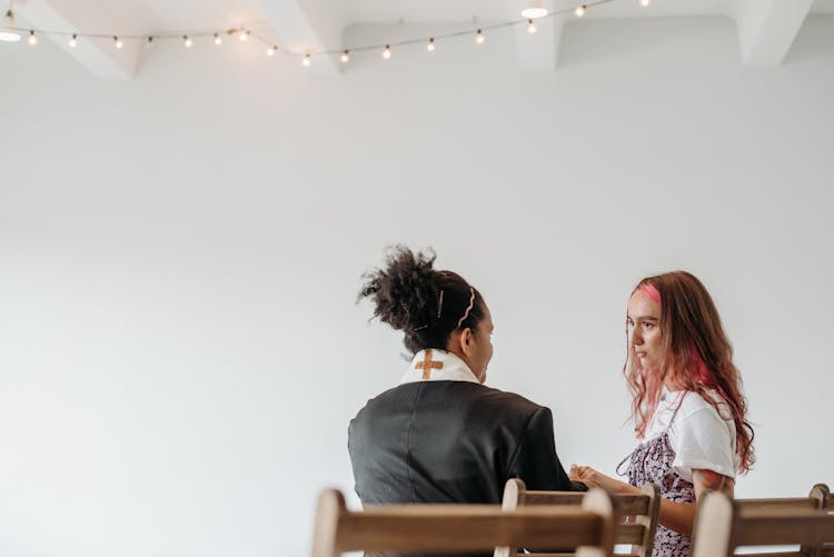 Two Women Talking Together 