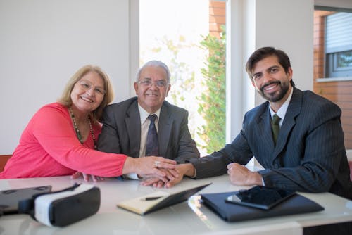 Free Three Business People Cooperating With One Another Stock Photo