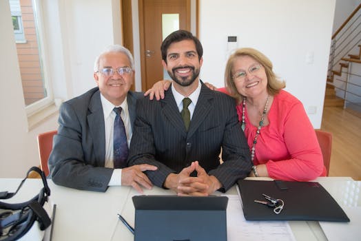 Group of business professionals smiling inside office setting, showcasing teamwork and real estate partnership.