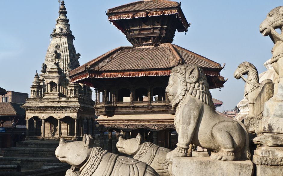 Ancient temples and stone sculptures in Bhaktapur, capturing Nepal's rich cultural heritage.