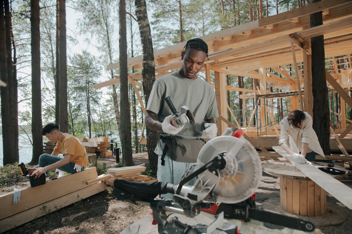 Men Constructing a Wooden House