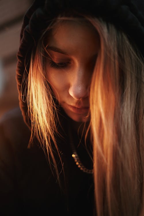 Free A Blonde in a Black Hoodie Stock Photo