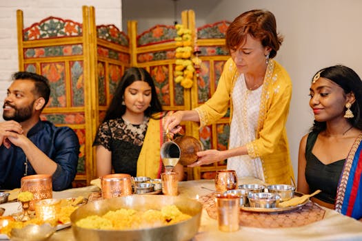 A festive dinner gathering with diverse friends enjoying a traditional meal indoors.