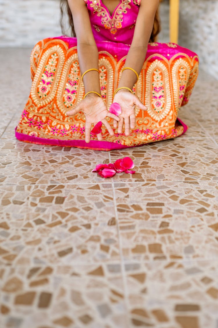 Person Holding Petals Of Flower