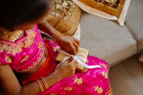 A Girl Holding a Gift Box