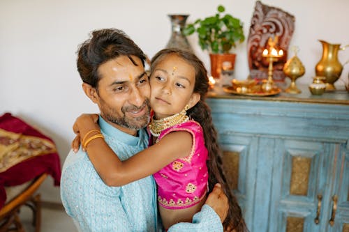 Free A Dad Carrying His Loving Daughter Stock Photo