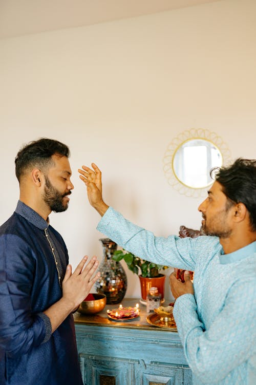 Men at Home Altar on Diwali Festival