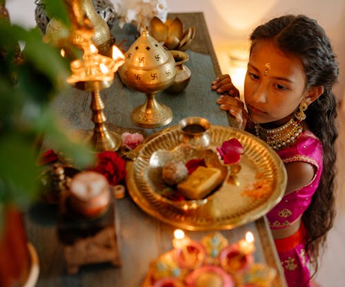 Girl Looking at Home Altar