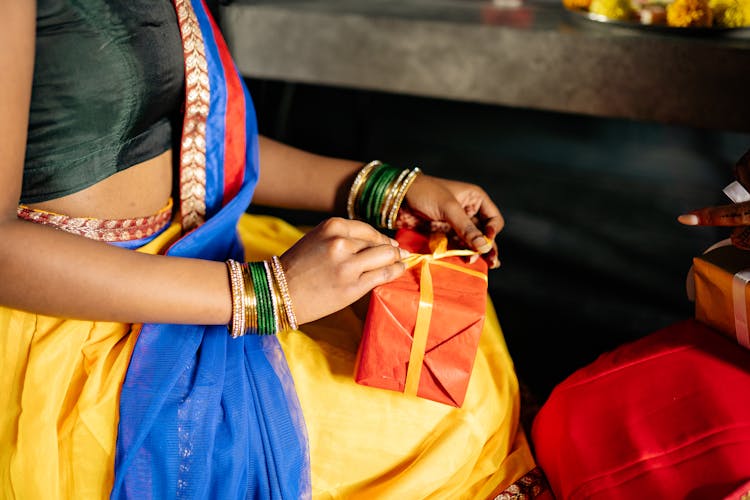 Indian Woman Wrapping Presents 