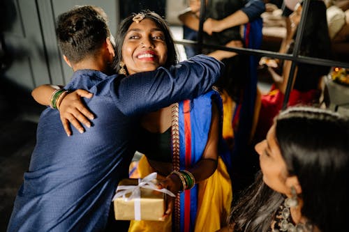 Happy People in Traditional Clothes Dancing · Free Stock Photo