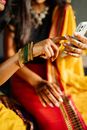 Person Wearing Silver and Gold Bracelet