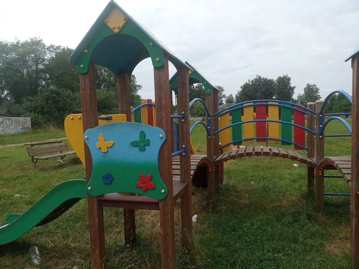 Dark horror laboratory with eerie green lighting and mysterious scientific equipment