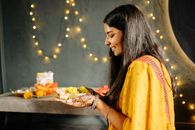 Woman in Yellow Dress Eating
