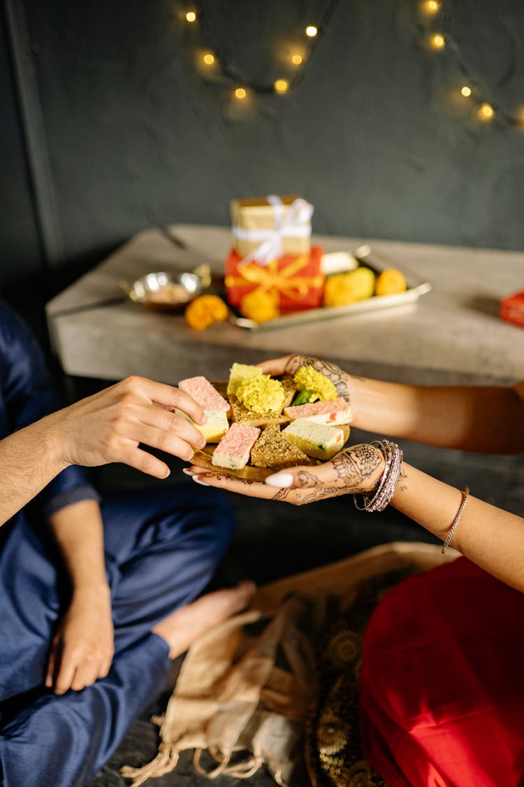 People Sharing Traditional Sweets