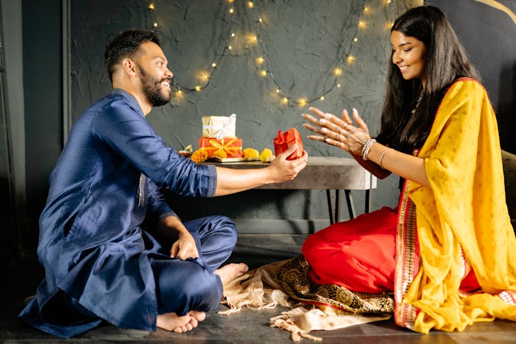 A Man Giving Gift To The Woman