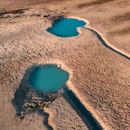 Blue Water on Brown Sand