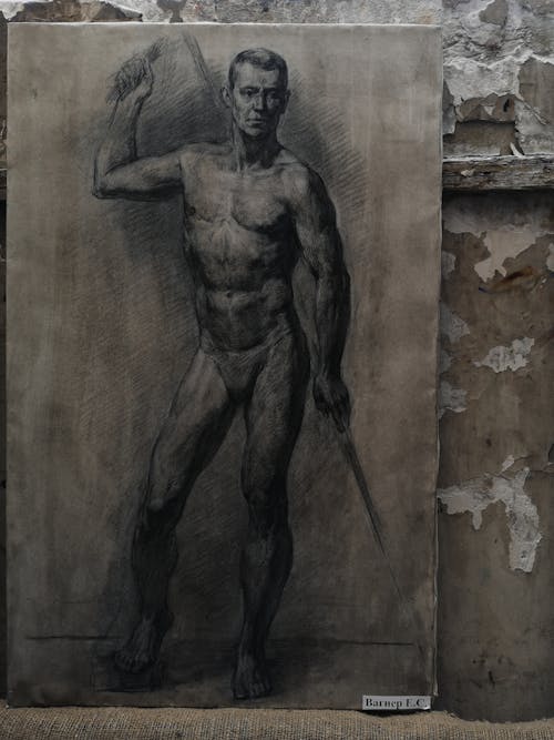 Free Man Holding Stick Statue Painting Stock Photo
