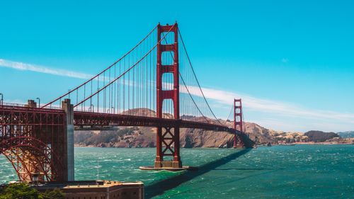 Free Stunning view of the Golden Gate Bridge spanning the San Francisco Bay under a clear blue sky. Stock Photo