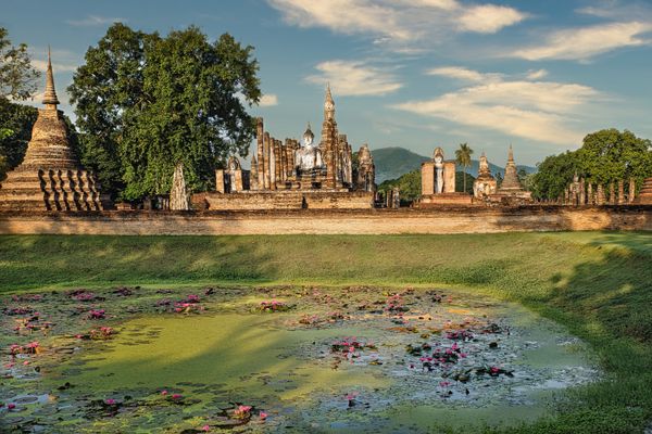 Ancient temple and lotus pond in Thailand