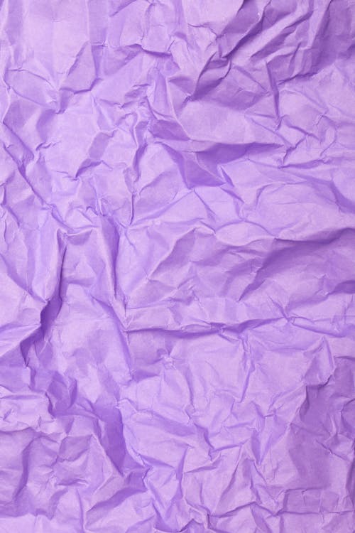 A Close-Up Shot of a Crumpled Purple Paper