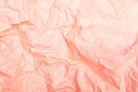 Pink Textile on Brown Wooden Table