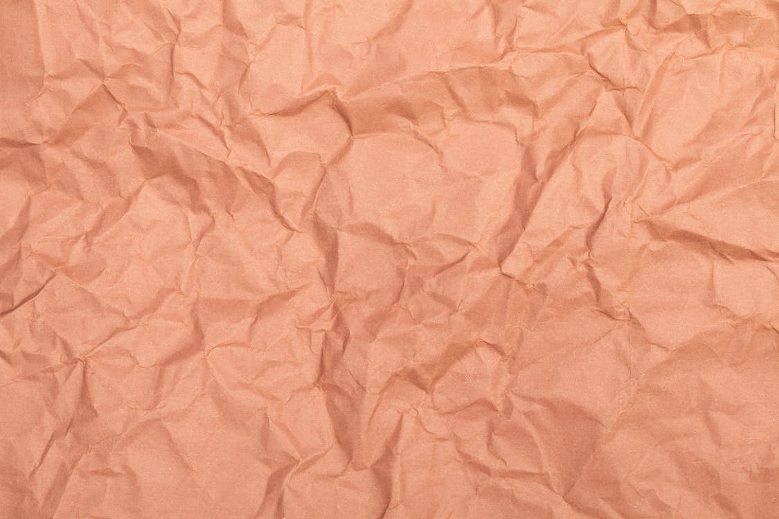 Close-up Photo of Crinkled Beige Paper