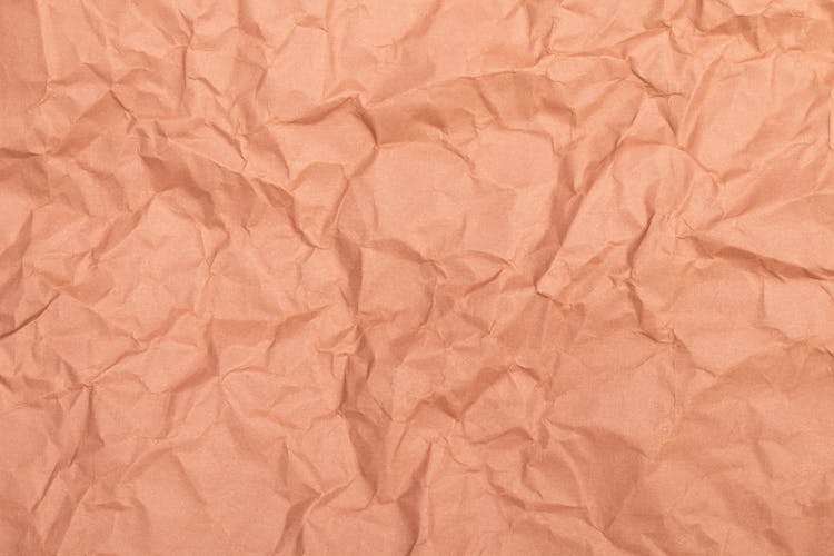 Close-up Photo Of Crinkled Beige Paper