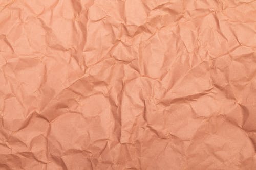 Close-up Photo of Crinkled Beige Paper