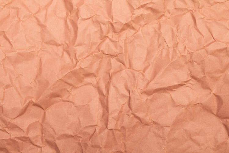 Close-up Photo Of Crinkled Beige Paper