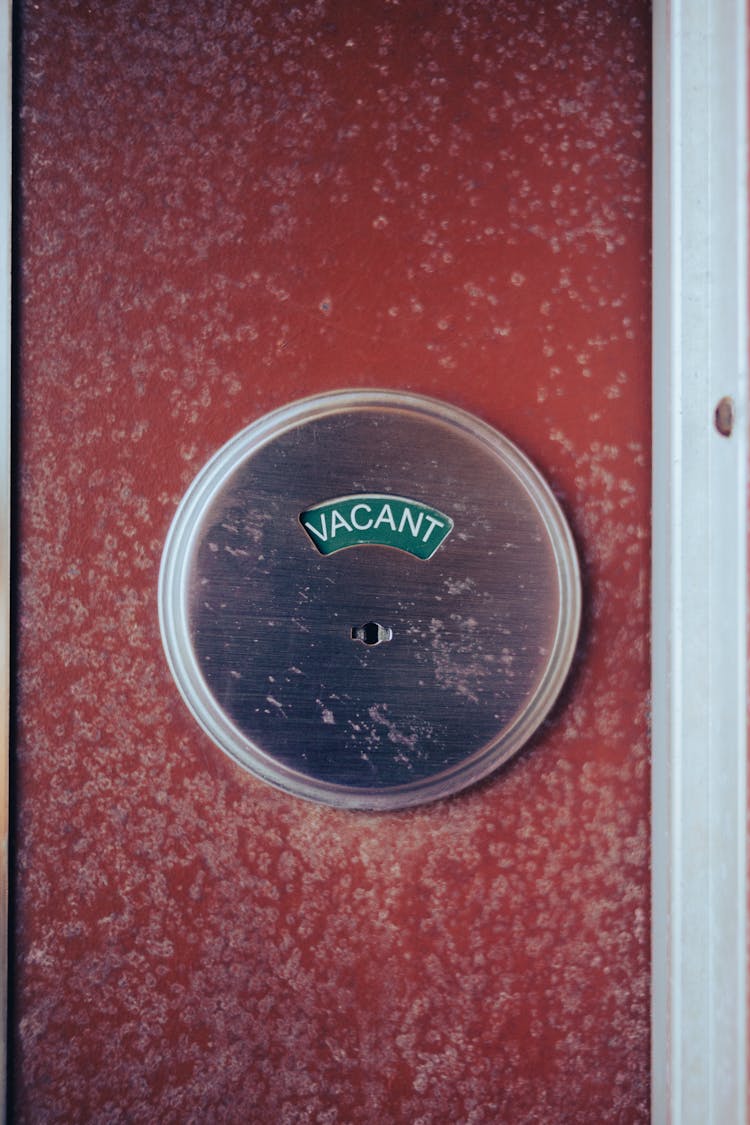 Vacant Sign On A Public Restroom Door